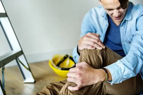 Worker receiving physiotherapy care